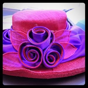 Red hat with purple and red satin Rose's and band
